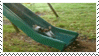 cat_on_a_slide_stamp_by_supremesonrio-d3